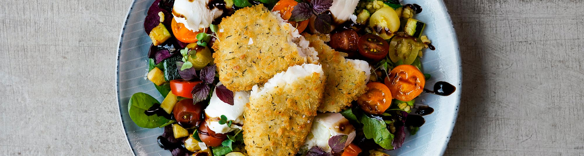 Oven visfilet Mediterraanse stijl met een salade van tomaat & mozarella&nbsp;