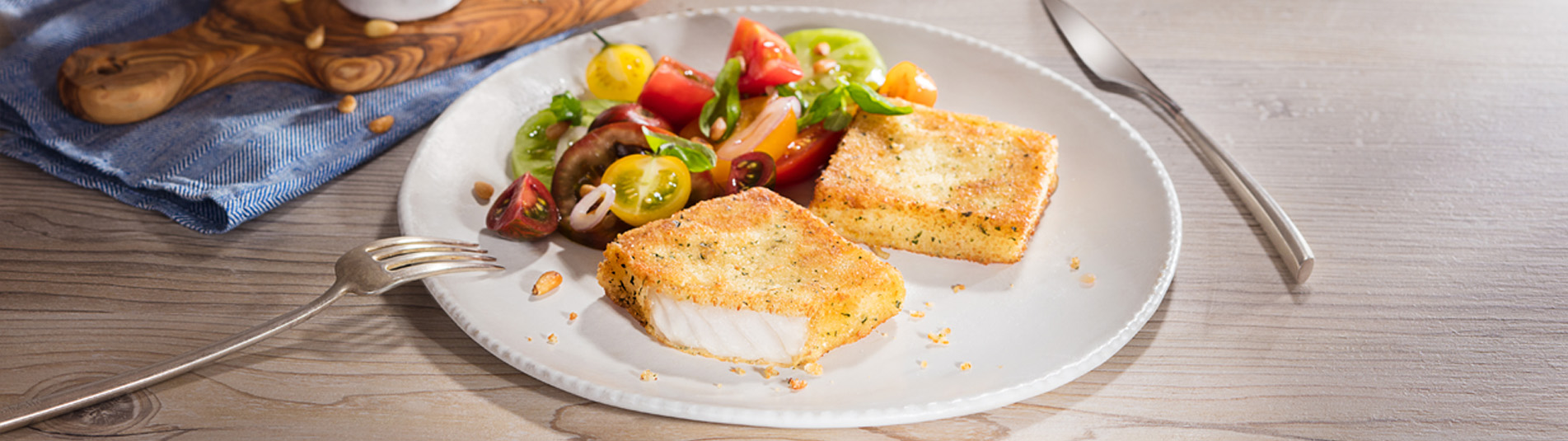 Oven visburger met frisse tomatensalade